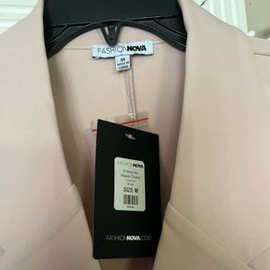 A cream pink fashoin nova long sleeve blazer dress. Size medium